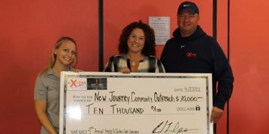 Check Presentation to NJCO for golf scramble