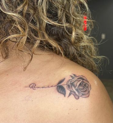 Rose on shoulder tattoo by Hector Salazar Tattoos in Yuma AZ