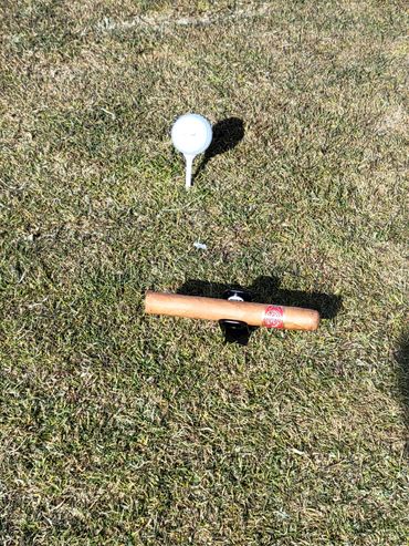 Cigar holder in the ground.