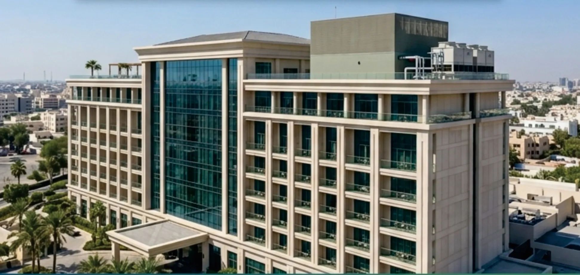 Modern multi-story office building with glass windows.