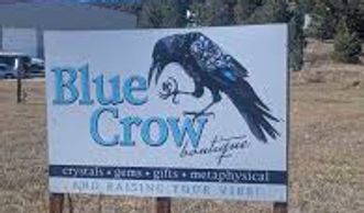 Sign for Blue Crow Boutique