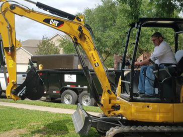Jeff Wolf preparing to provide excavation services.