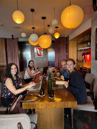 group of people working with flowspitality doing a hotel strategy in a hotel in guatemala city