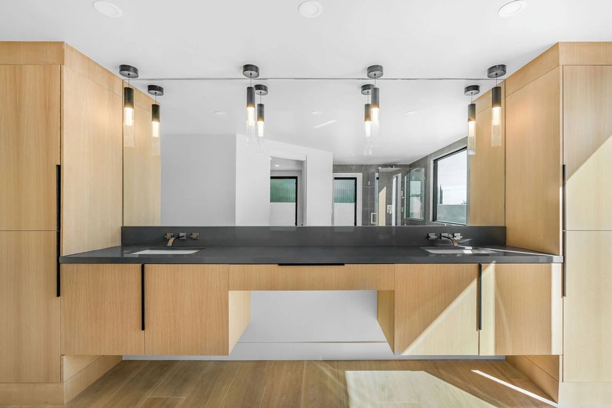 Custom bathroom vanity in white oak by Justice Renovations in Temecula, CA
