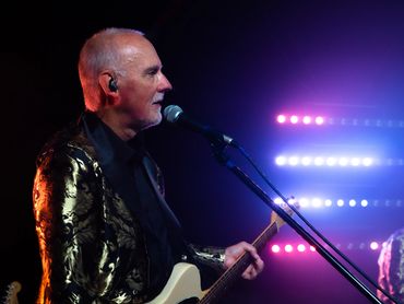 A photo of the band Re-Release performing live.