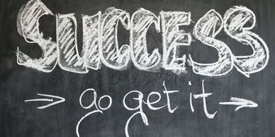 "Success, go get it" written on a blackboard