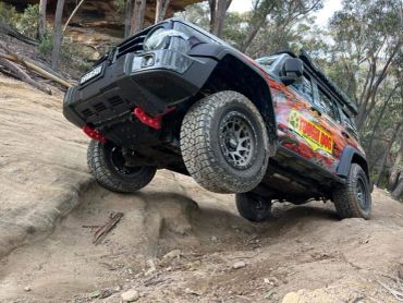 GREAT WALL TANK 4WD WITH ONE TYRE HANGING IN AIR FITTED OUT WITH TOUGH DOG SUSPENSION