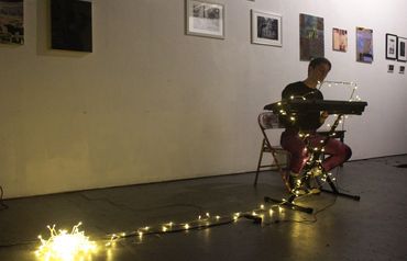 Sage McKay performing original song at PILOT opening.