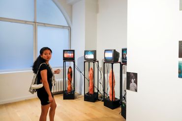 One person looking at artwork.