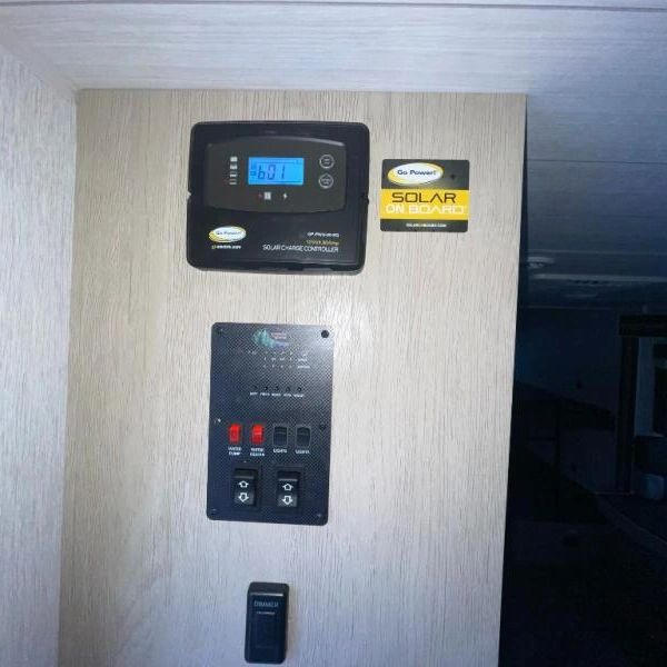 Photo showing Command Center to immediate left inside front door...slide & pump controls, as well as