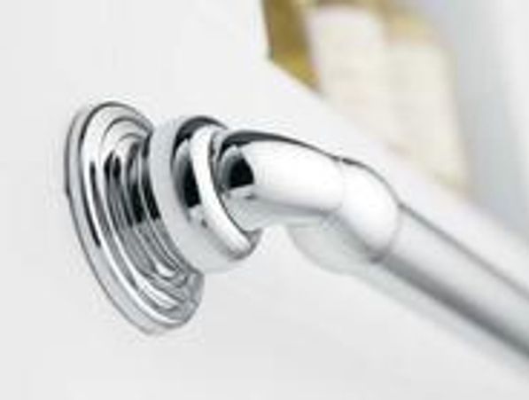 A steel grab bar as handle in a bathroom