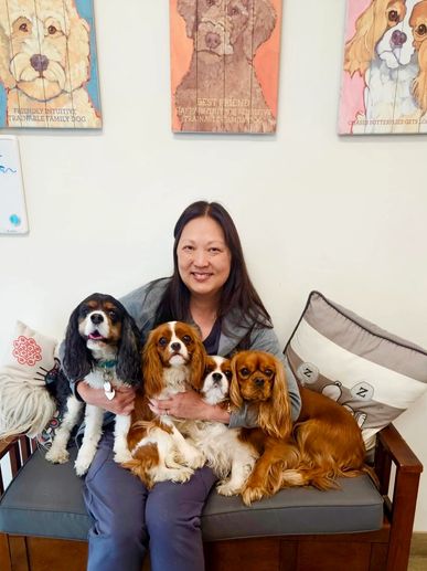 Dr. Keng with  Ruby, Penny, Rosie, and Archie (From L-R)