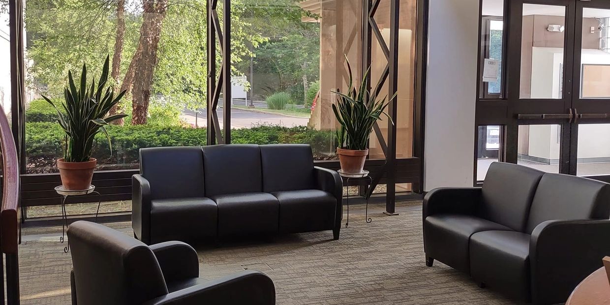 a tidy commercial office lobby maintained by a professional office cleaning crew