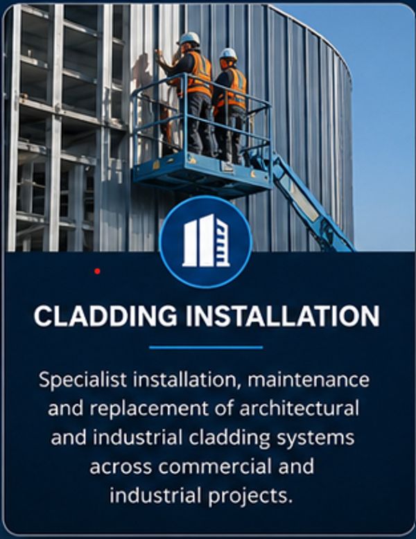 Workers installing cladding on a building using a lift.