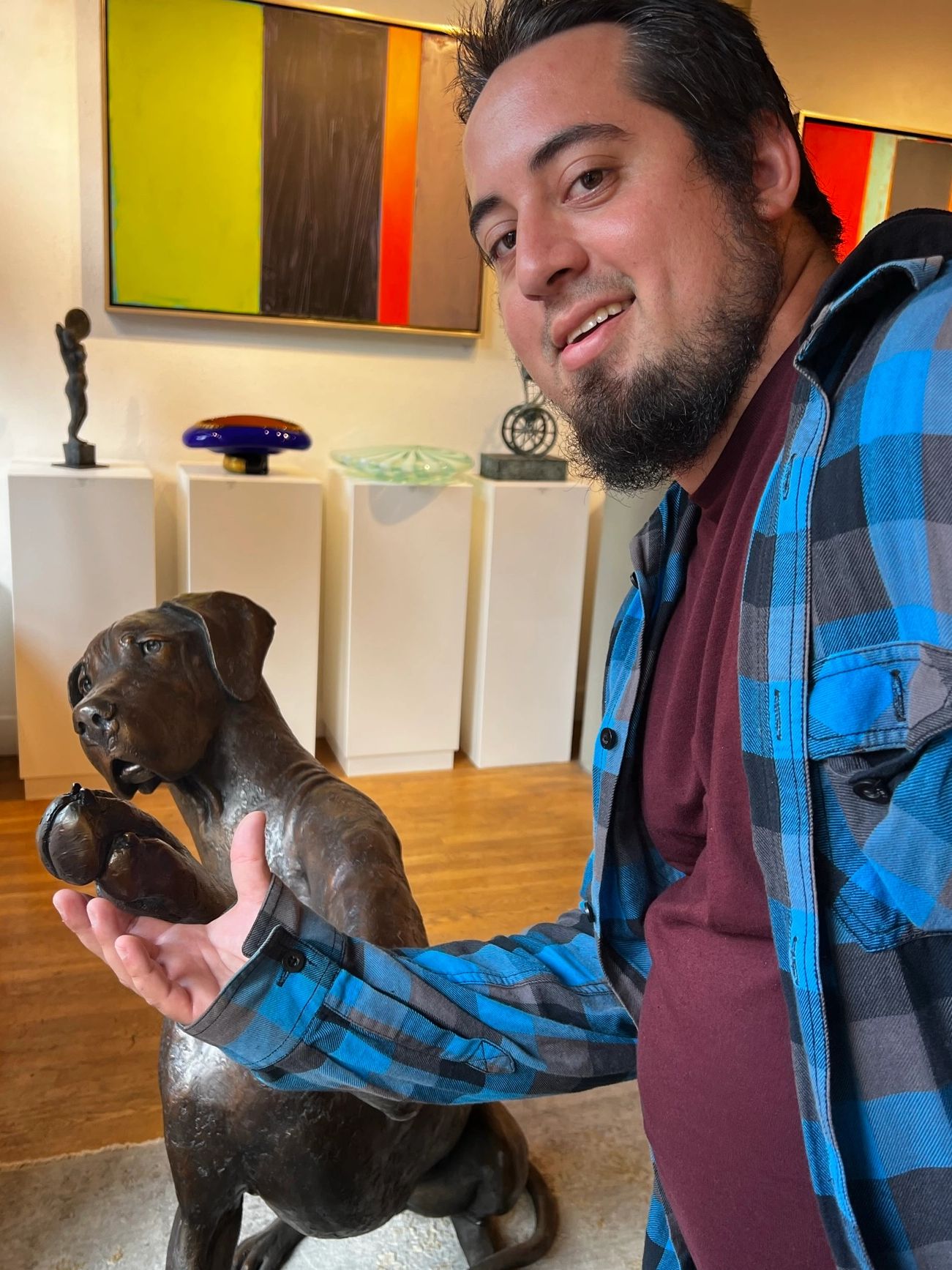 Justin Posing with a pet statue!