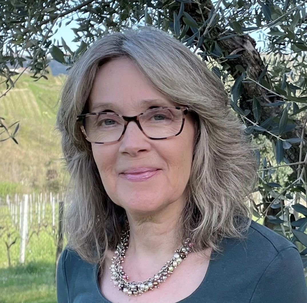 Nikki Mattei in front of an olive tree
