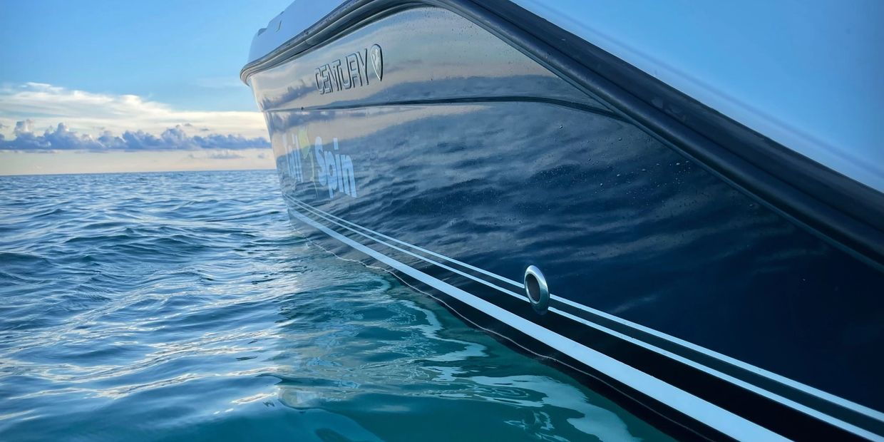 Tailspin, the custom charter vessel for AquaLife Charters, anchored and ready for a private charter