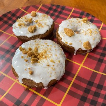 Gluten free gingerbread donuts with a vanilla glaze