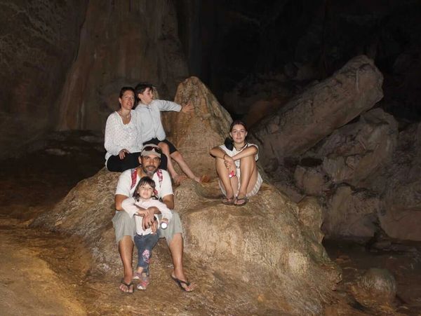 Family in the Bat Cave in Bukit Lawang, Sumatra, Indonesia
