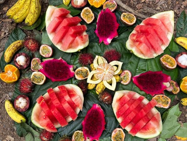 Fruit salad with watermelon, banana, rambutan, passionfruit, dragonfruit and mandarin
