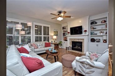 Living room with fireplace and cozy seating to watch all your favorite TV shows
