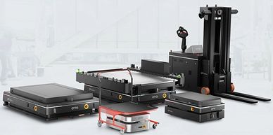 A collection of automated guided vehicles (AGVs) for industrial logistics and material handling.