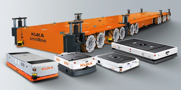 Various KUKA automated guided vehicles and platforms in a studio setting.