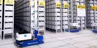 Automated robot navigating tall shelves in a modern warehouse.