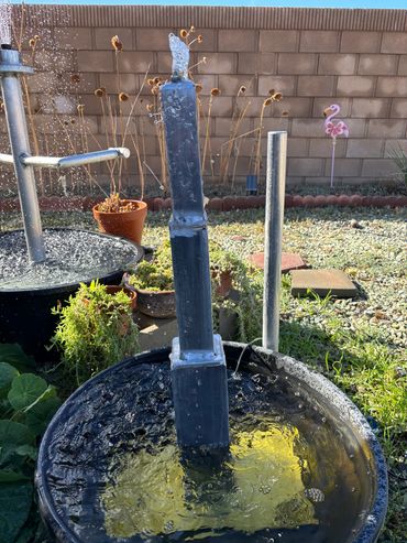 Empire Fountain. Comes with a 124 gph pump and 12 volt solar panel.