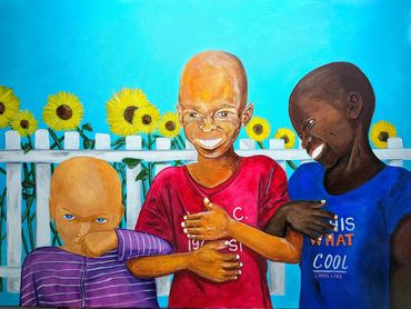 Three smiling children with sunflowers and white fence in the background.