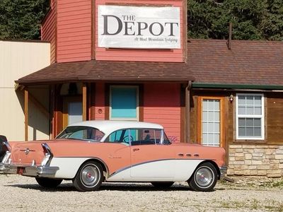 Mad Peak Depot with 1956 Buick Special two door riviera hardtop. Tahiti Coral and white.