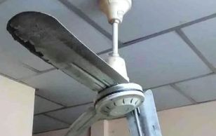 Old Ceiling rusty fan that needs replacing.