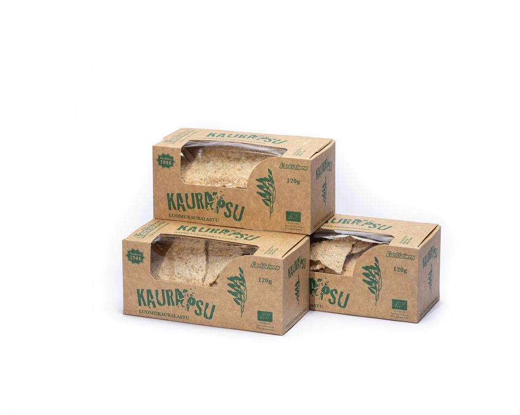 Three boxes of Kaura Psu organic oat flakes in brown packaging.
