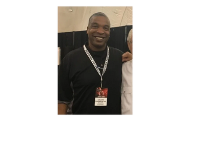 Calvin Thompson with Dick Vermeil