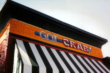 Exterior sign painted on walls.