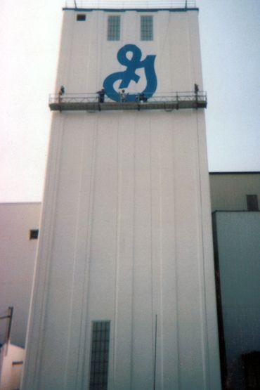General Mills Logo Hand Painted two stories tall. Exterior Sign Painting