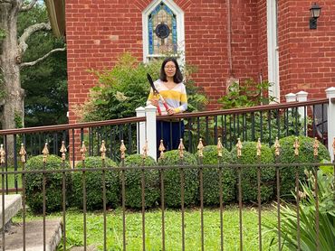 Esther gifts Rehobeth bushes with a beautiful trim.