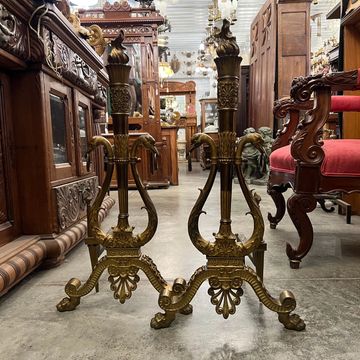 Pair antique brass andirons with swan and torch details circa 1920