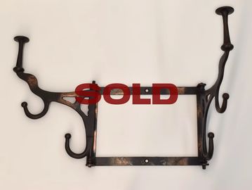 Antique 1890s wall mounted japanned finish swing arm coat and hat hooks