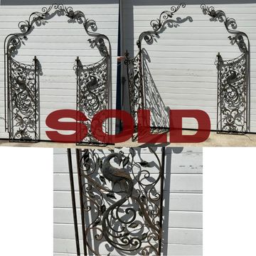 Victorian antique garden gate with peacock and flowers