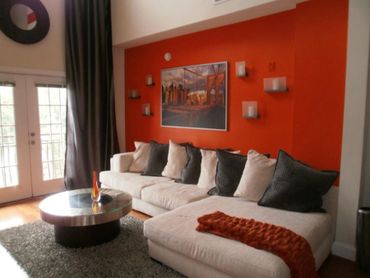living room with orange wall