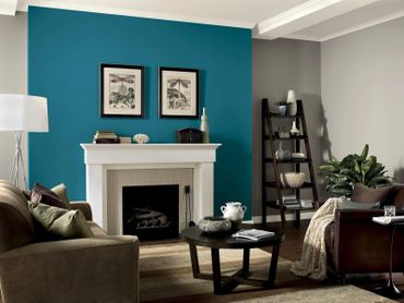 living room with blue painted wall