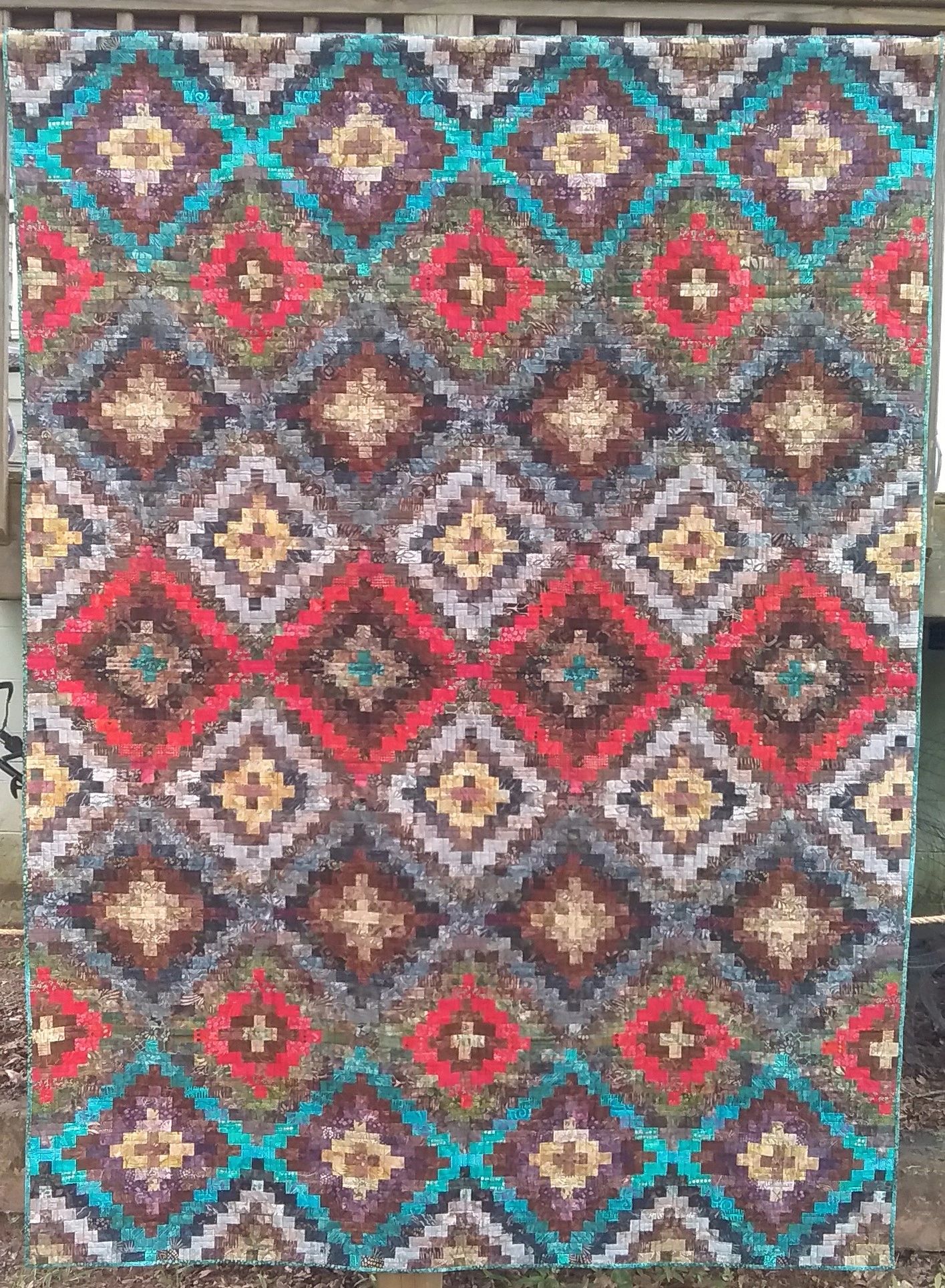 Full Size Strip Pieced Pattern Quilt in Red, Turquoise, and Neutral Batiks