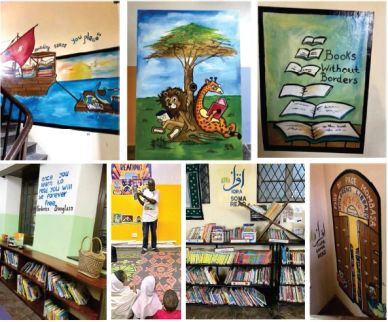 Colorful library murals and bookshelves inspire young readers in a vibrant community space.
