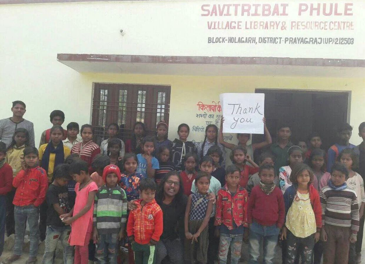 Students at Savitribai Phule thanking RuralLiteracyEmpowerment's library donations and funding