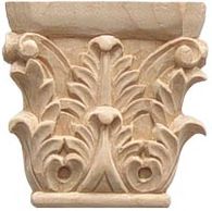 Intricately carved stone capital with acanthus leaf design.