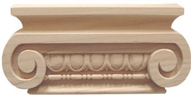 Wooden decorative architectural element with classical scroll design.