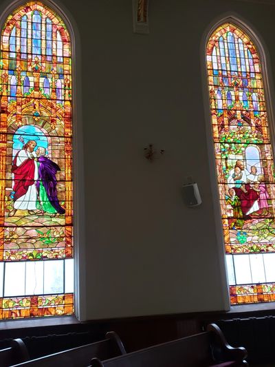 Two stained glass windows in the Sanctuary.