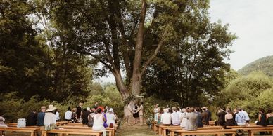 Hudson Valley Officiant Rev. Lisa Zaro presides over a LGTBQ+ ceremony. Photo by Nicole Nero Studio.