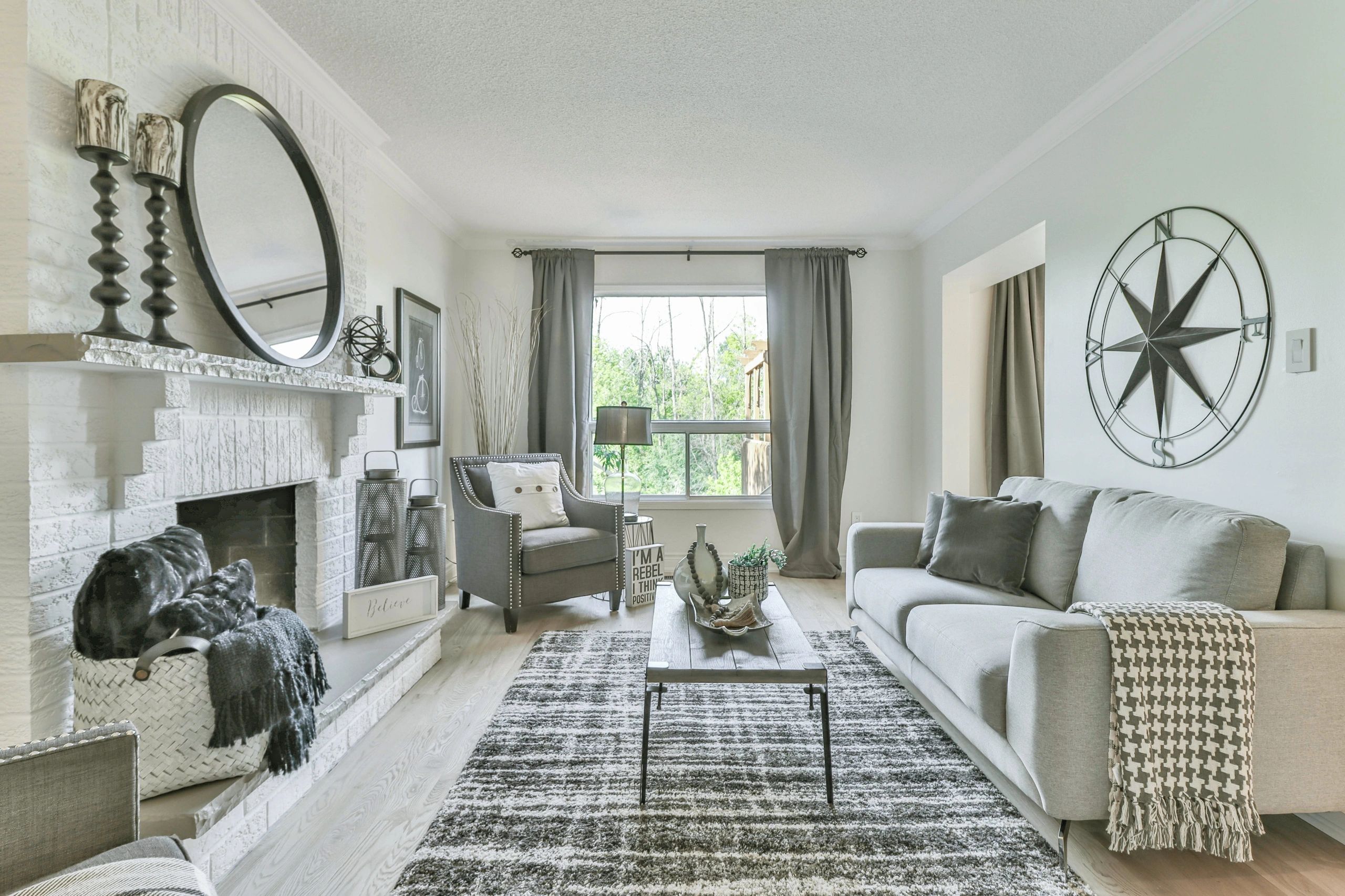Living Room with fireplace, couch and nice furnishings